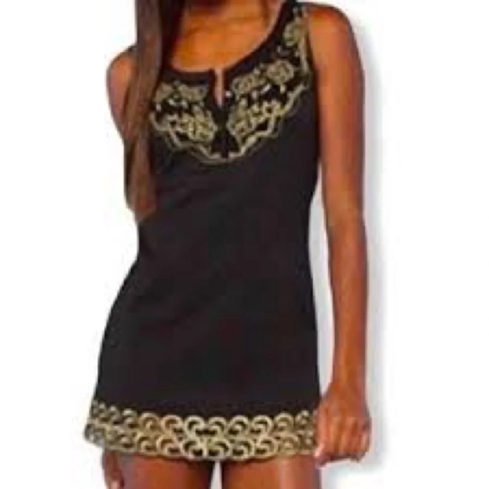 Free People sleeveless black dress with gold metallic embroidery.